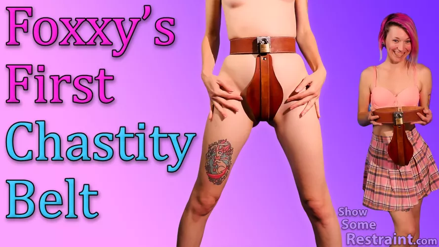 First preview of Foxxy in the leather chastity belt. More pics (with less text) coming soon