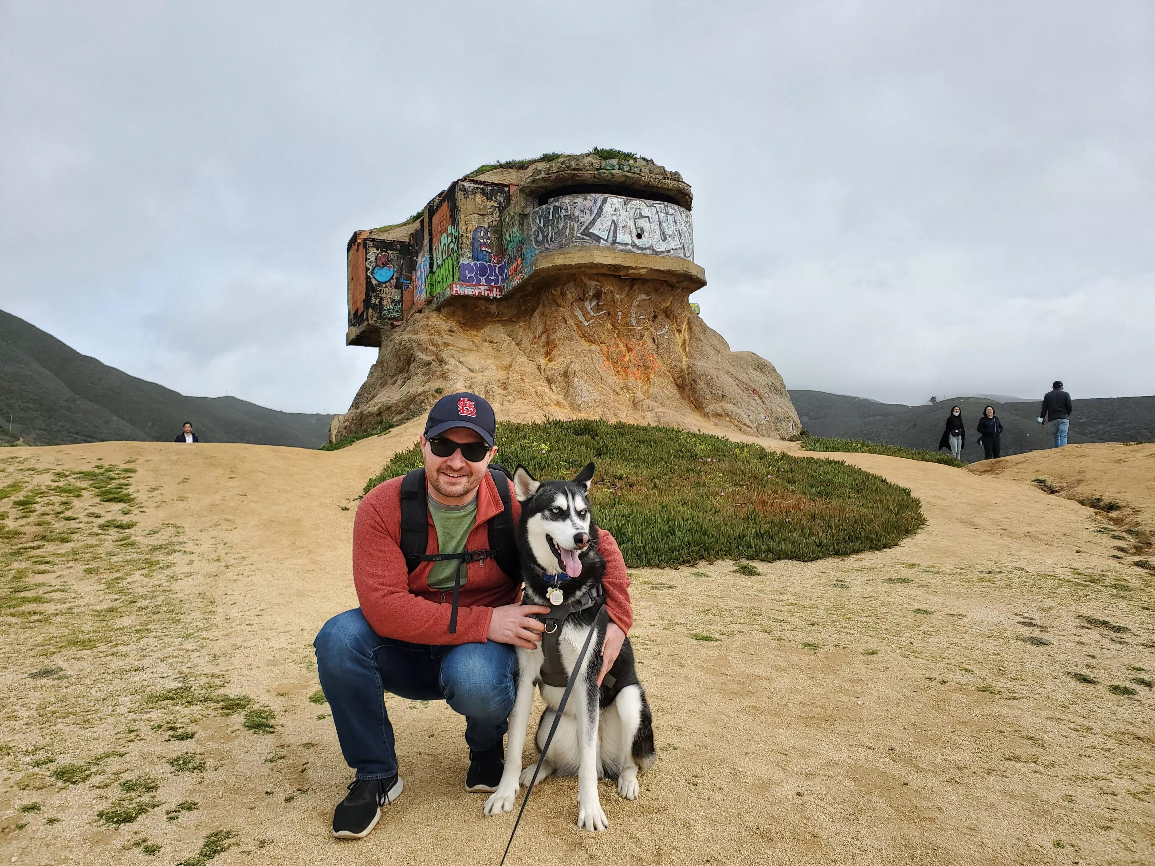 It's my cake day, so here's a picture of me with my husky Siku just before a hike