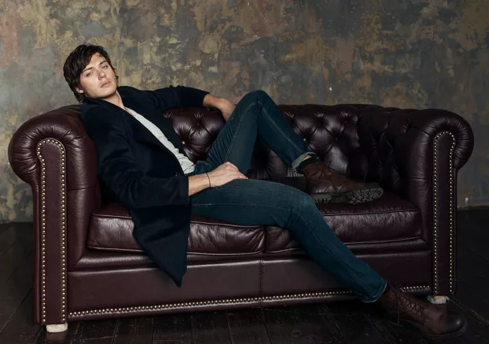 This sofa can accommodate two people.