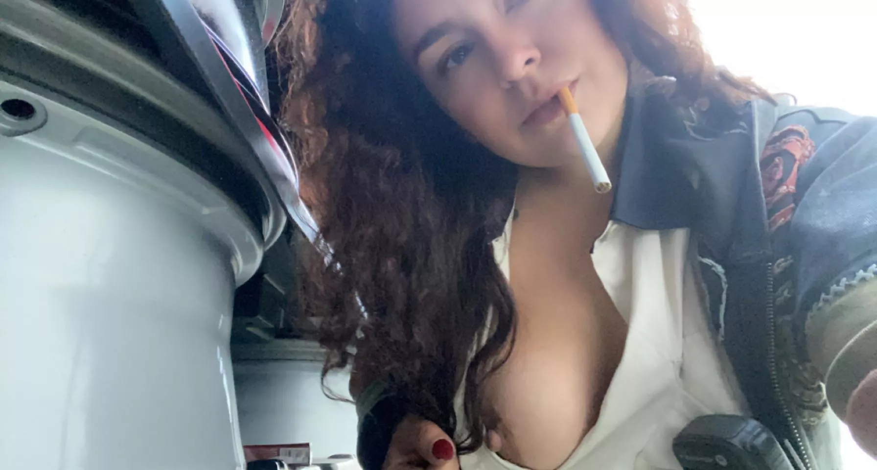 Boss doesn’t know I’m outside sneaking a smoke showing off my tits!