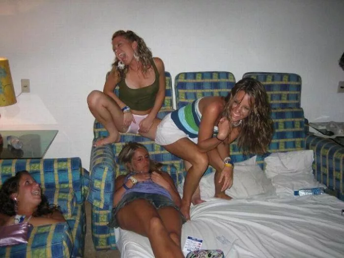 Think she might be farting in her sleeping friends face, at the very least she’s giving her a good panty flash