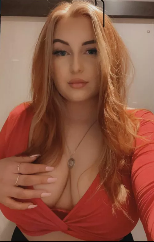 Busty redhead