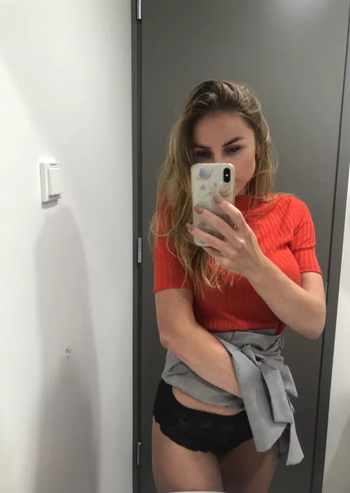 teasing you with my black panties while being at work