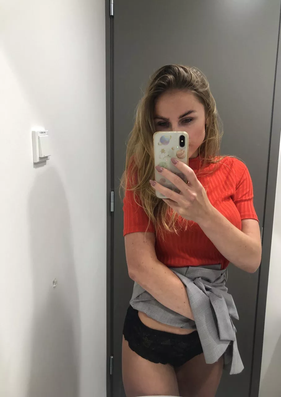 teasing you with my black panties while being at work