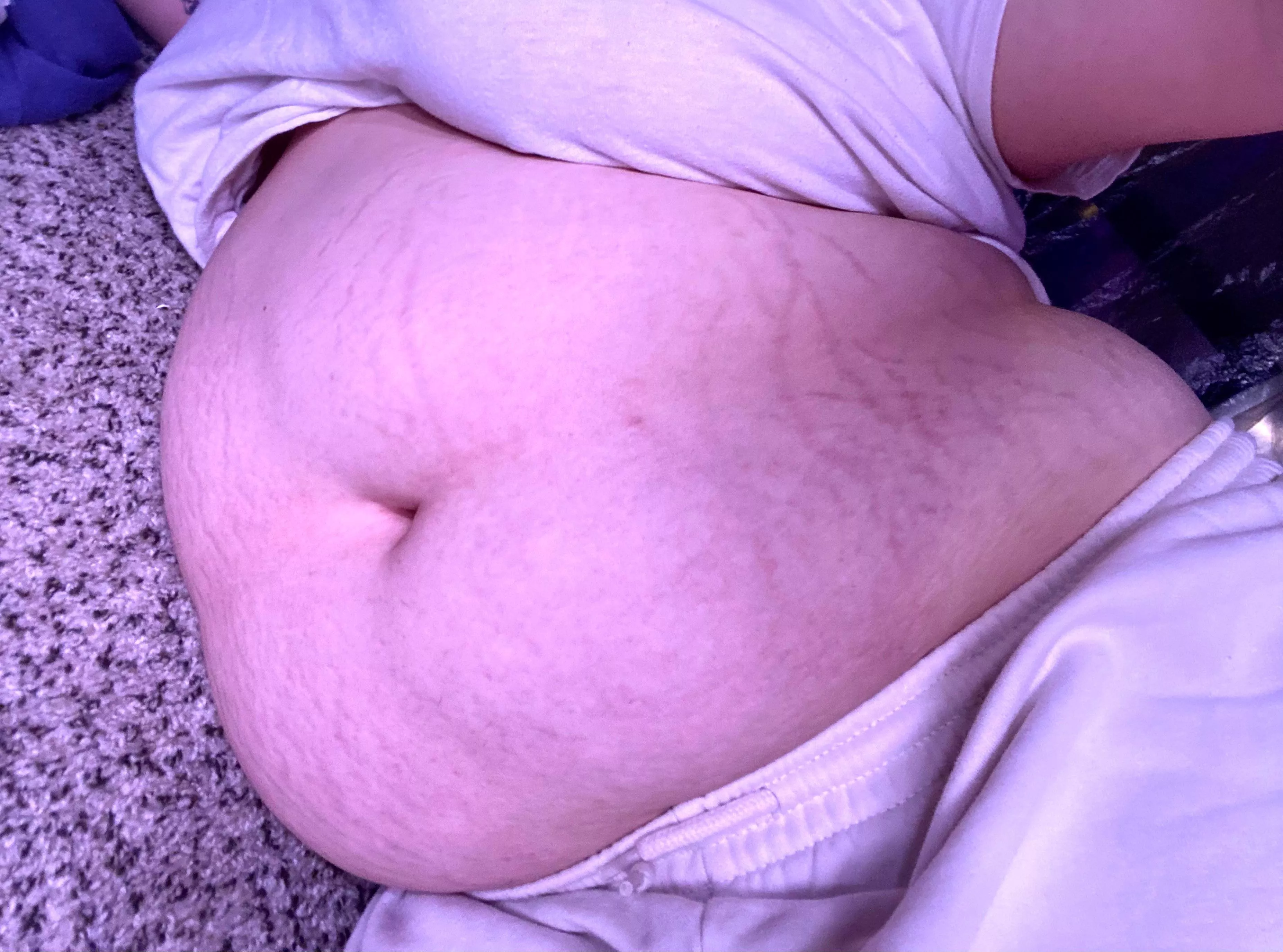 My clothes can’t keep my belly covered