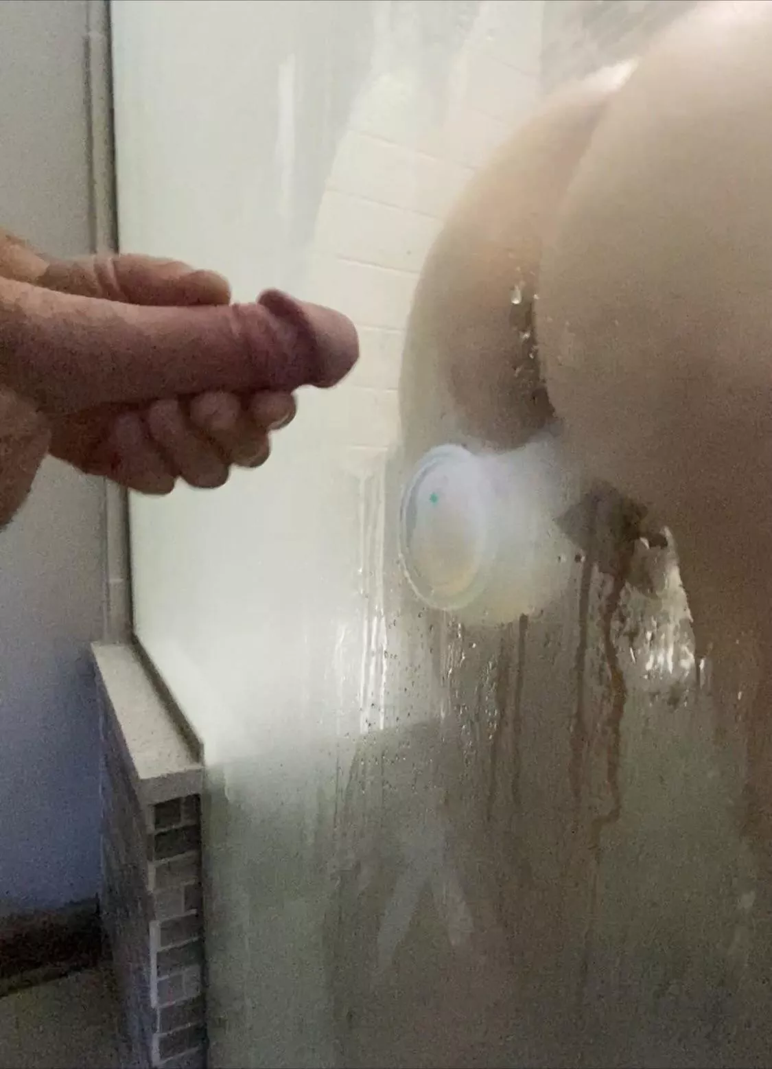 Love getting teased as she plays in the shower.