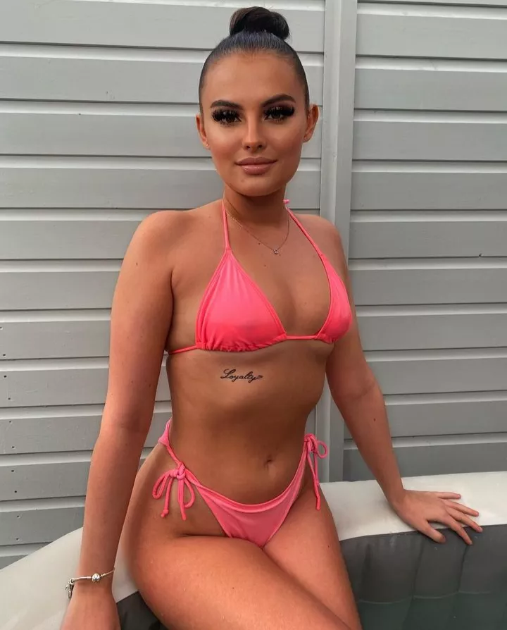 Sy in her pink bikini