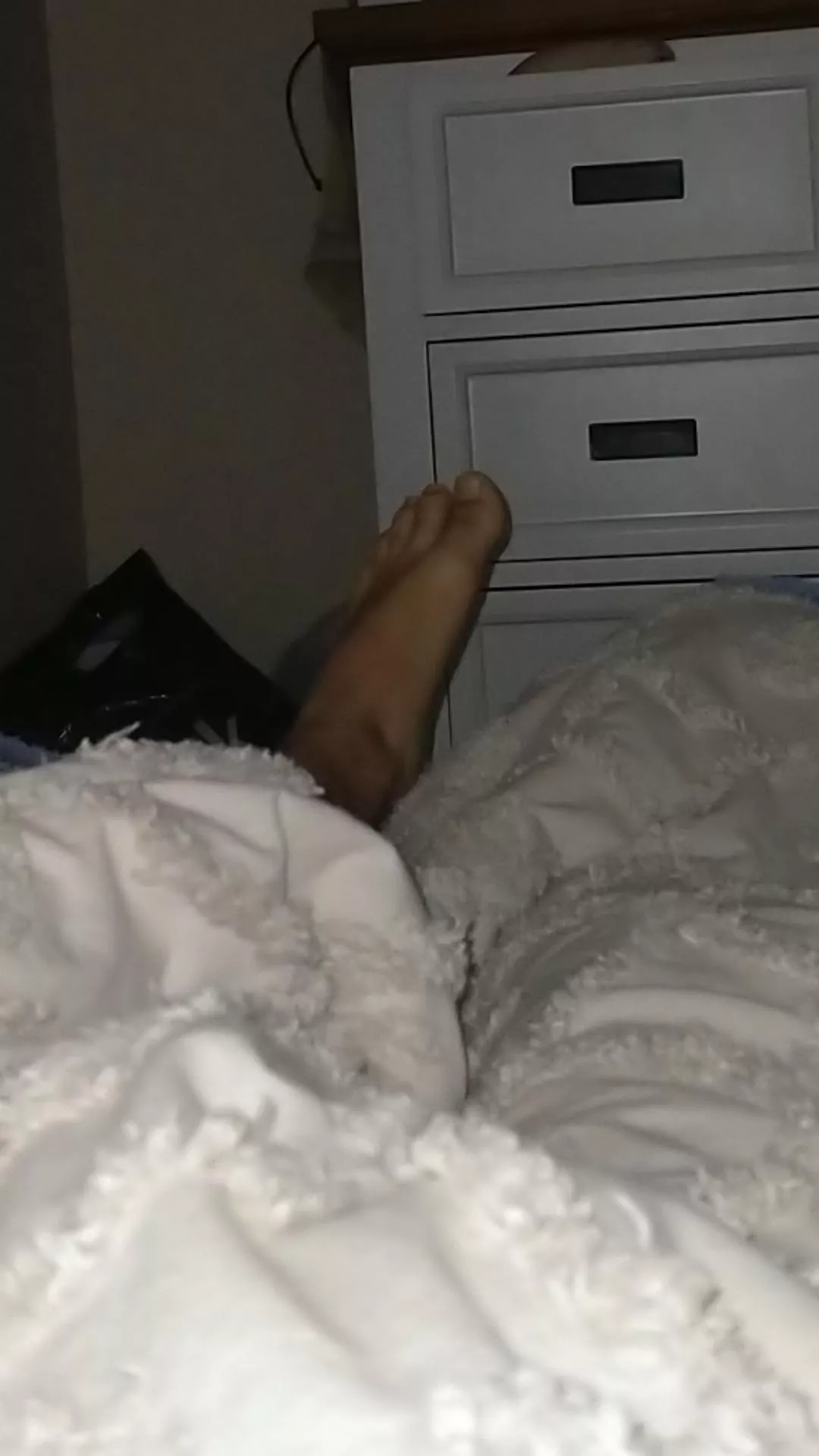 Anyone else sleep with one foot out of the bed hoping it gets played with 😴