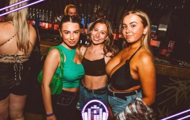 Forcing that smile between her friends