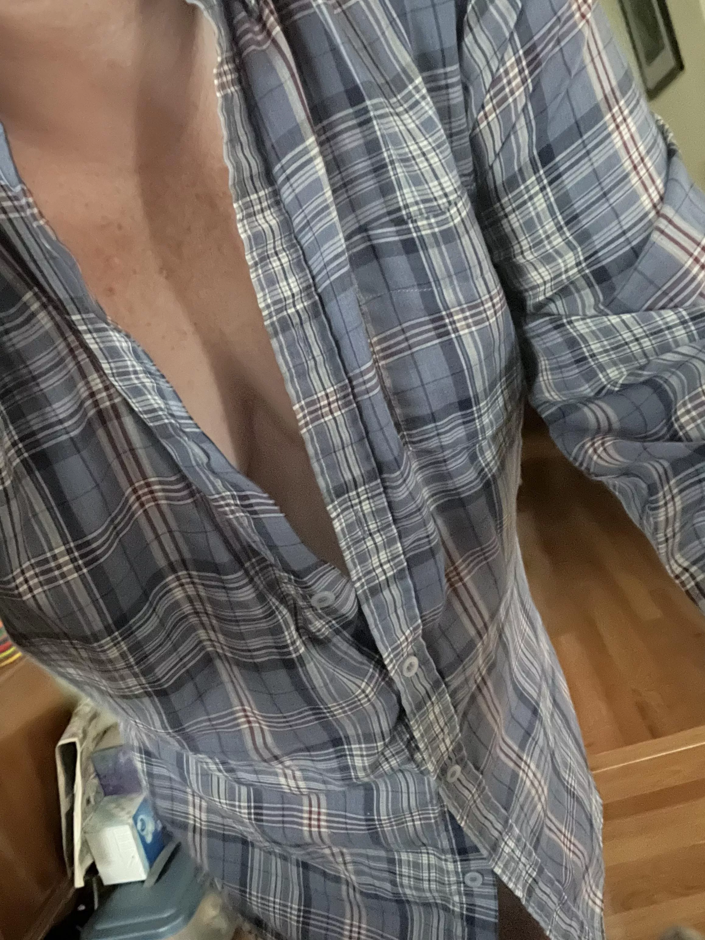 It started raining outside so I got chilly and had to put a shirt on....