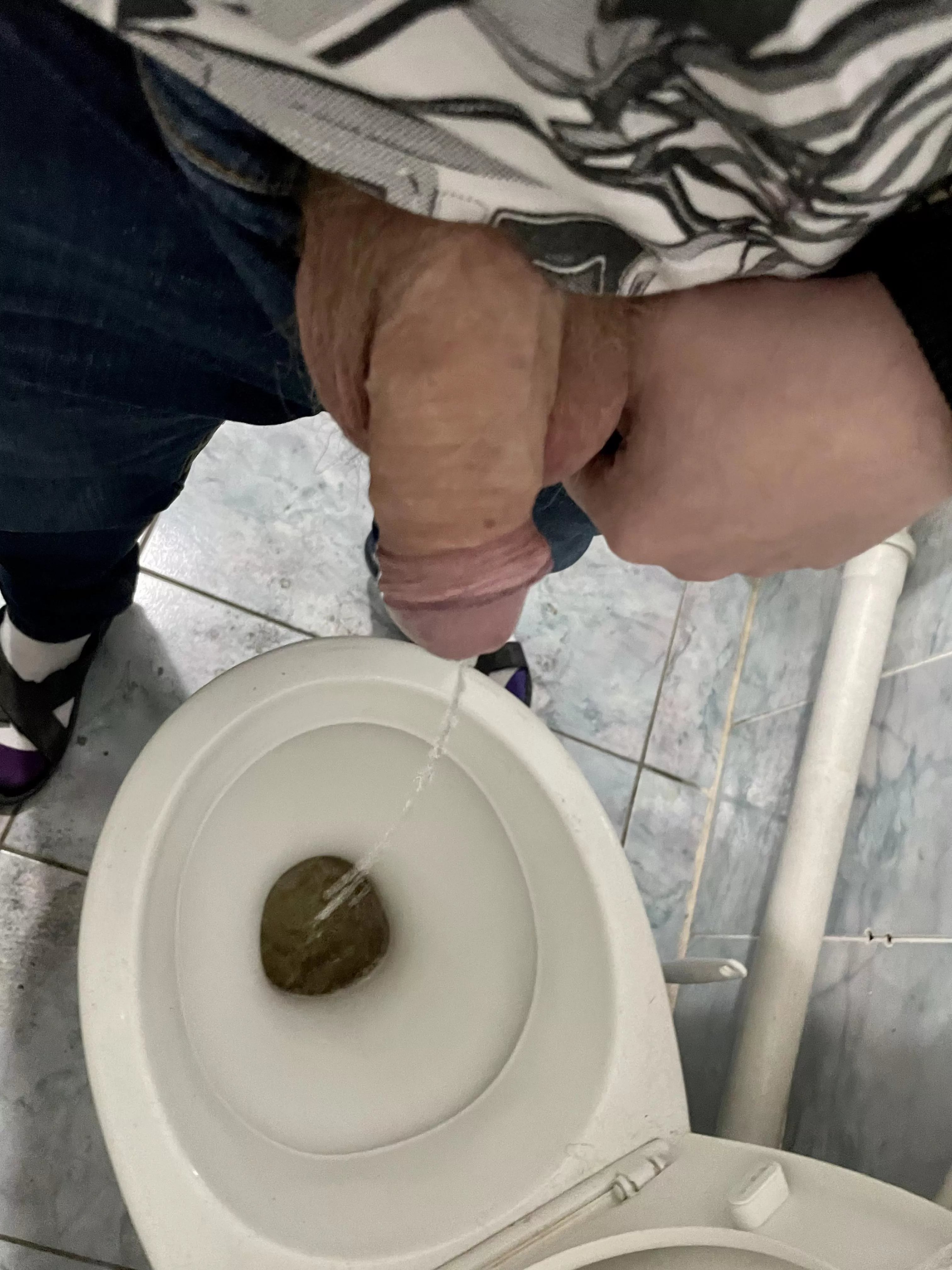 It’s curved to the left, but I learned to aim directly at the center