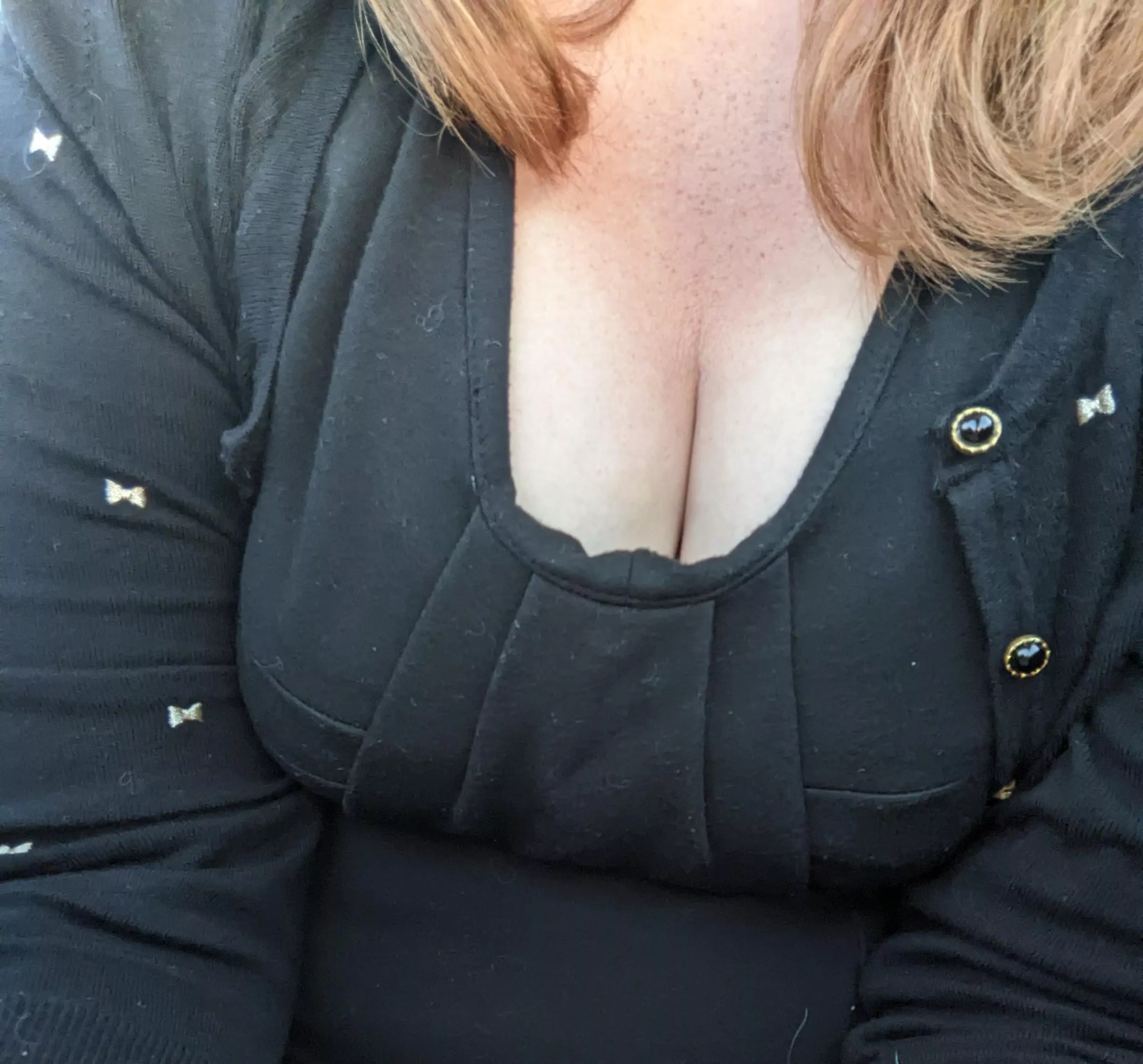 My cleavage and freckles are on display in my work dress today.