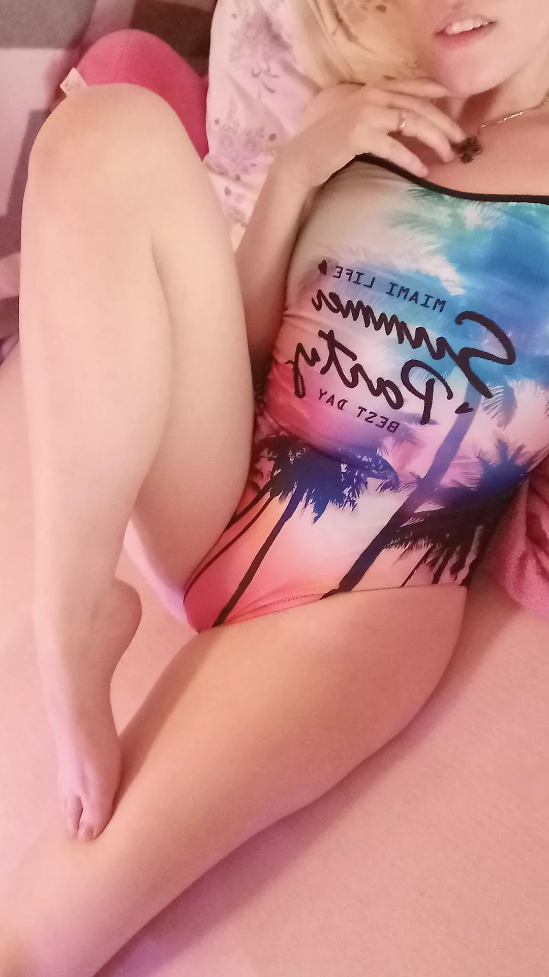 you see a small girl in a one piece swimsuit, which part of her are you looking at first?