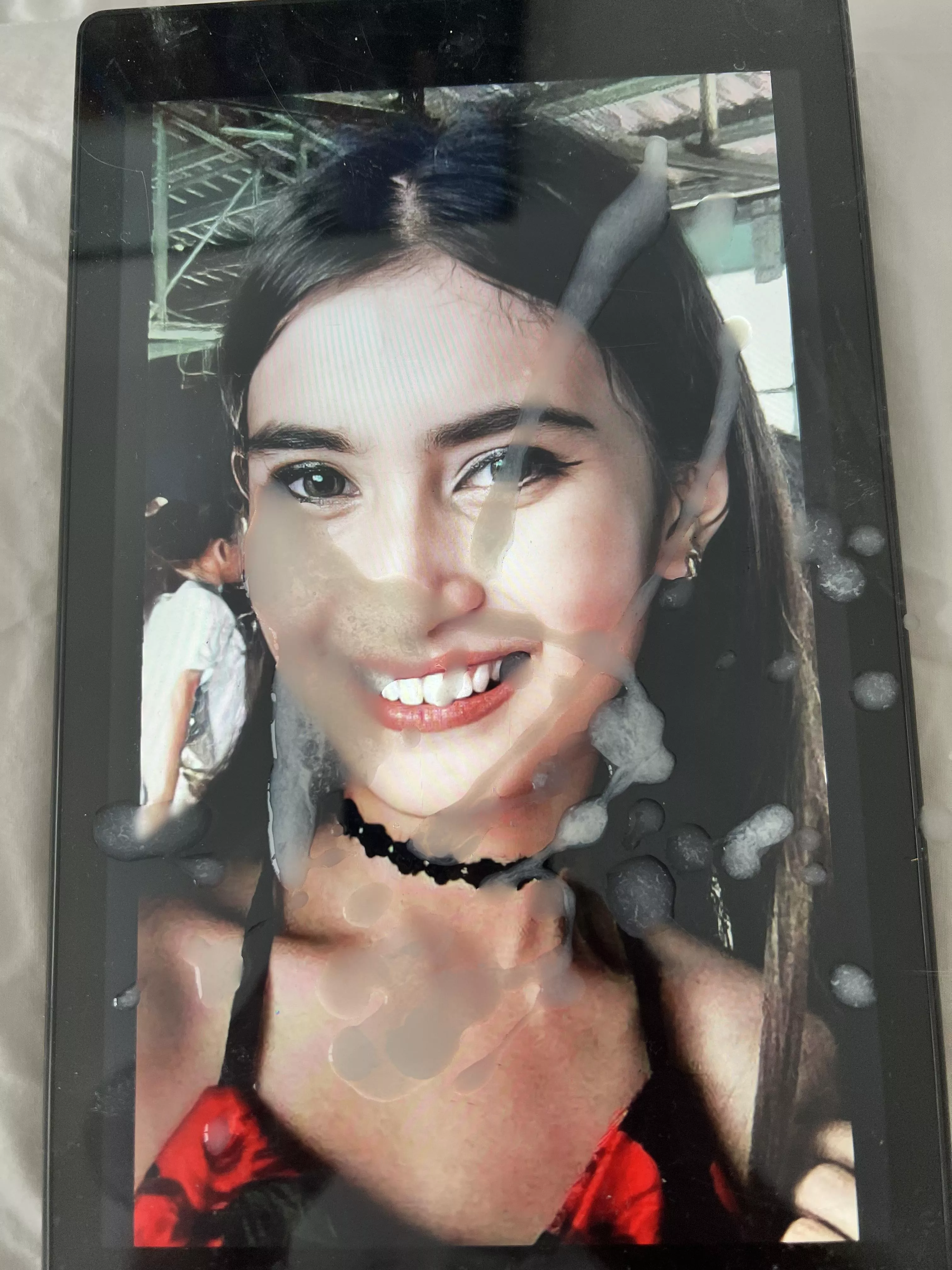 Blew a hot load on her cute face!