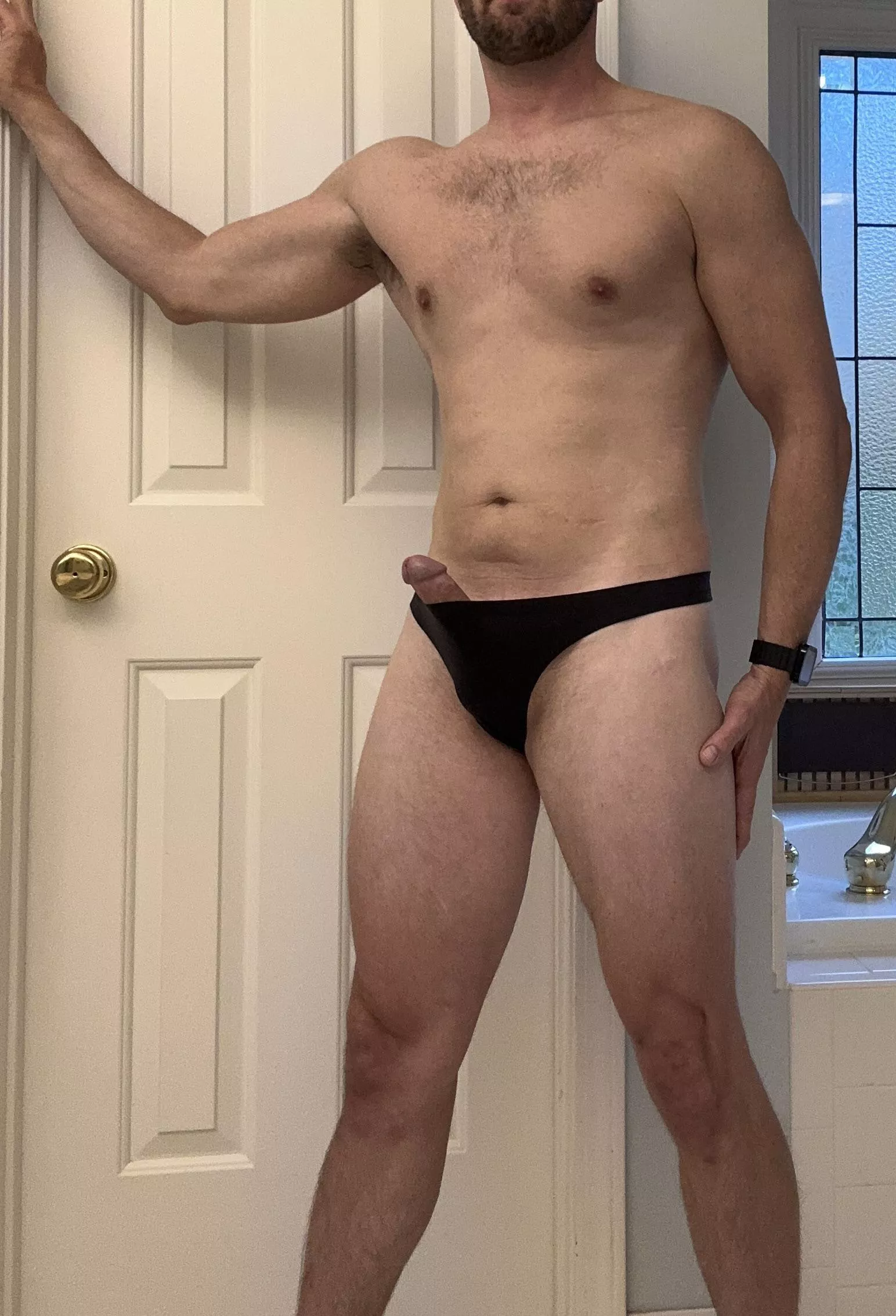 Peeking out of little black thongs.