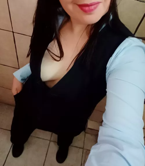 Quick work selfie for you! Can you guess what I'm wearing under my clothes?