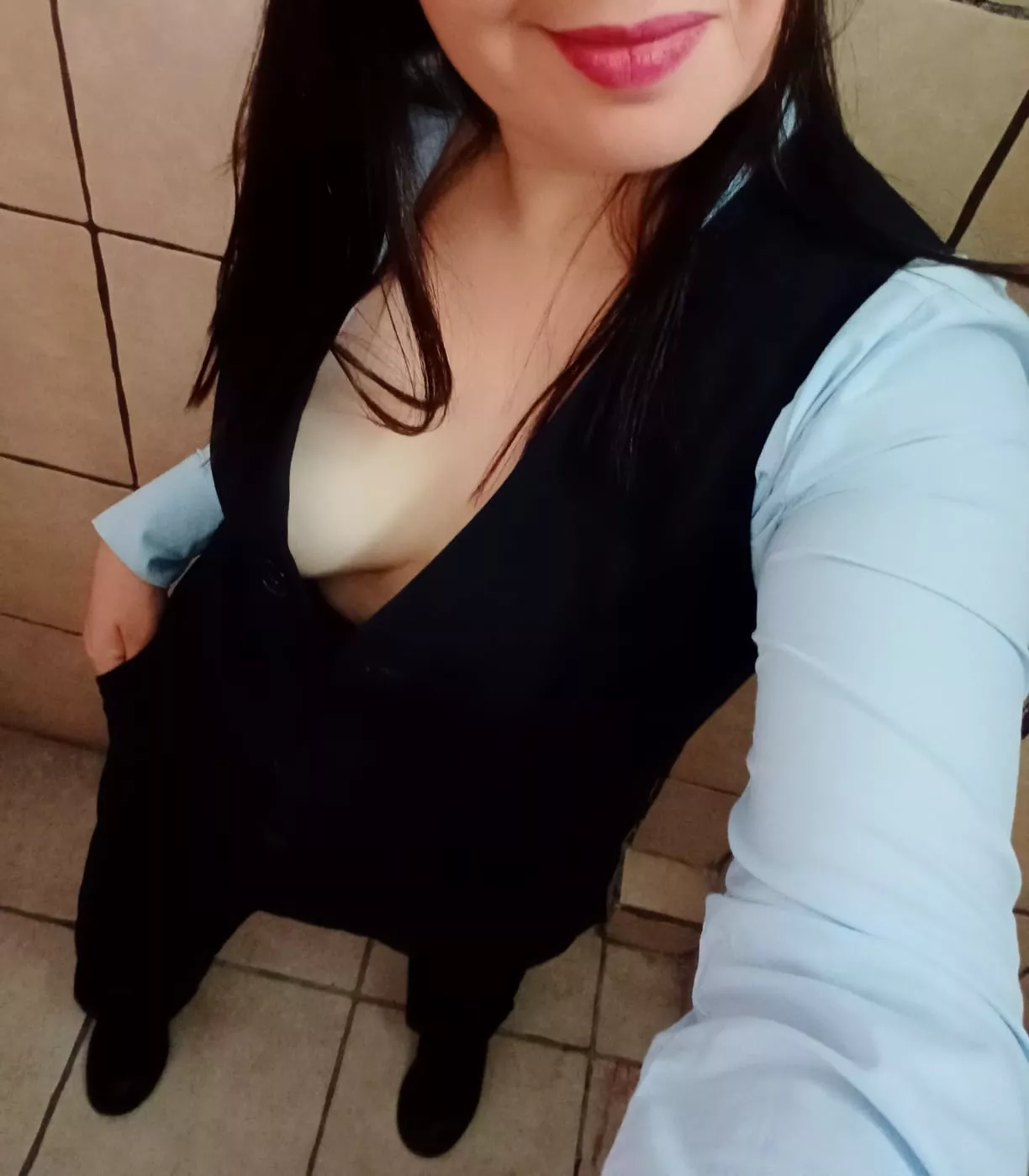 Quick work selfie for you! Can you guess what I'm wearing under my clothes?