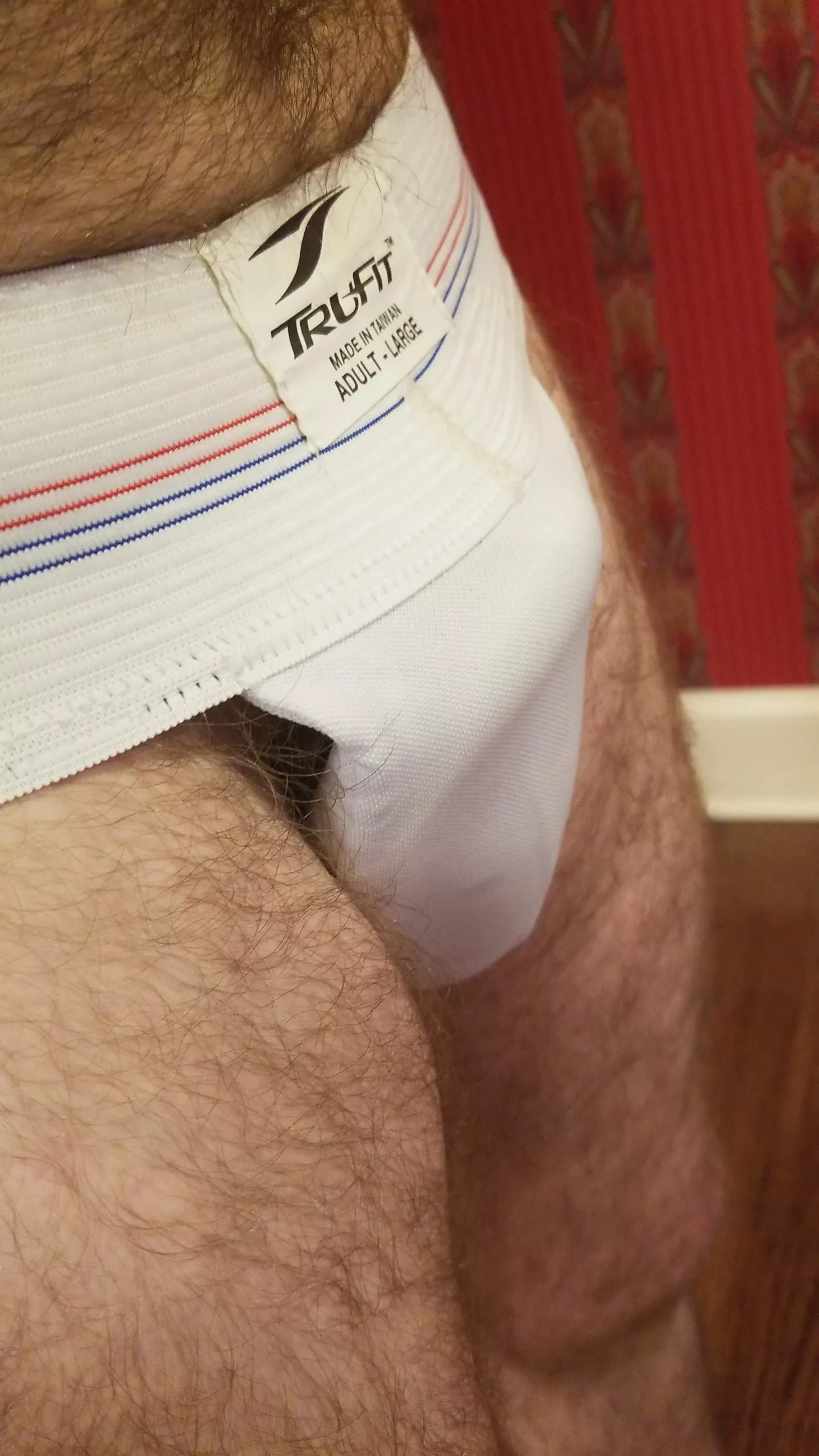 stripping down to my cup in the entrance to the entrance way of the locker room