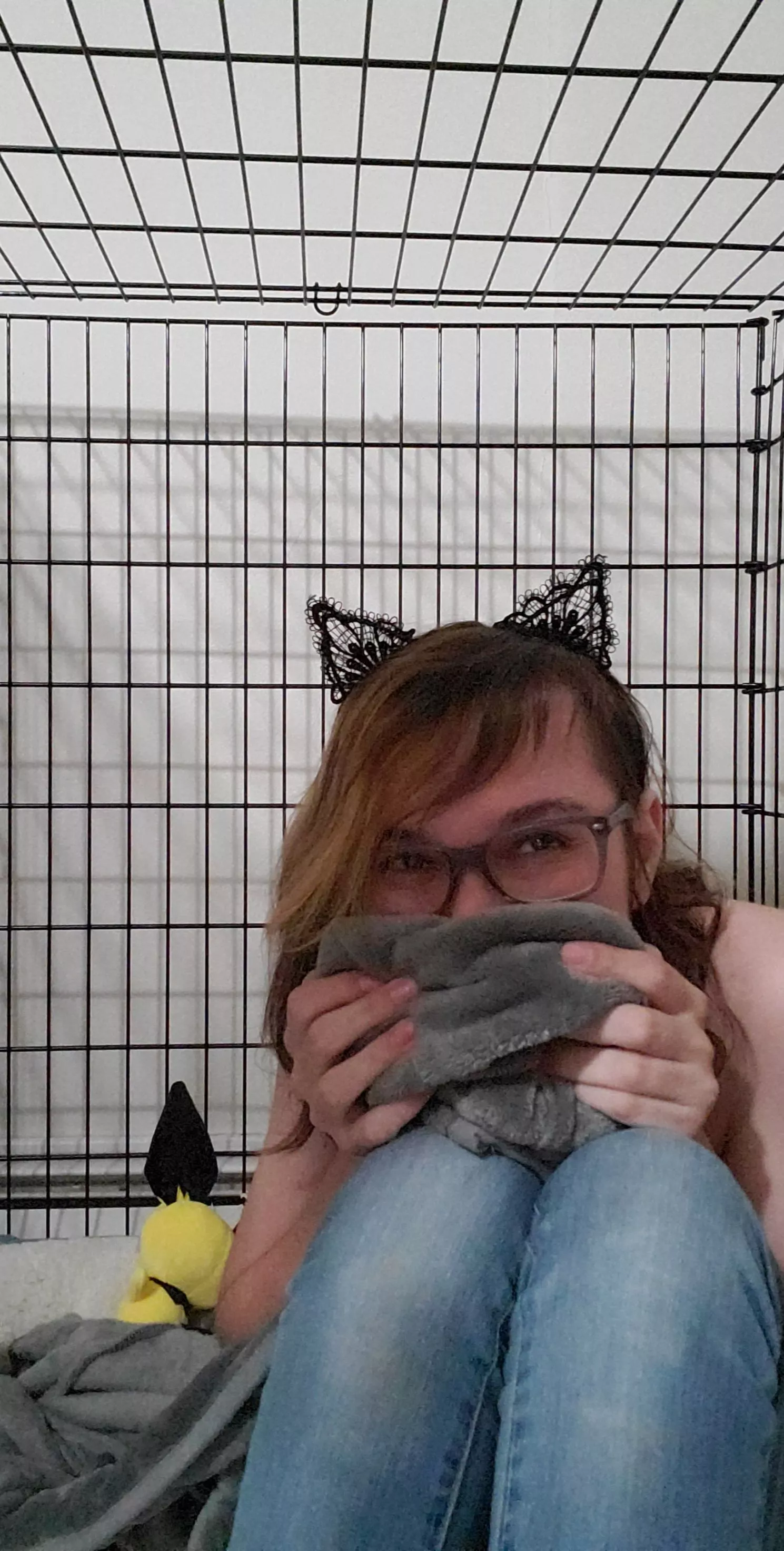 Feeling playful in my cage!