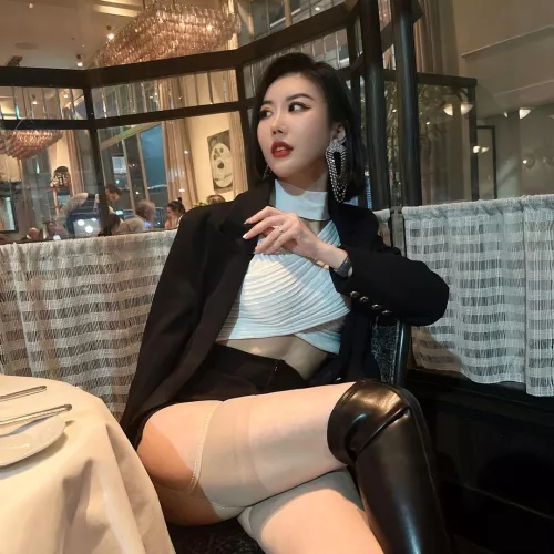 Tall boots and nude stockings