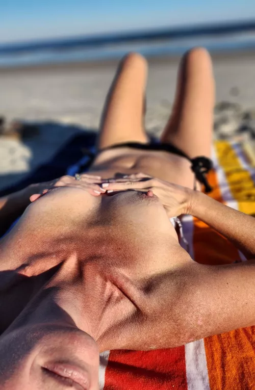 Would you be ok next to this 42(f) topless at the beach?