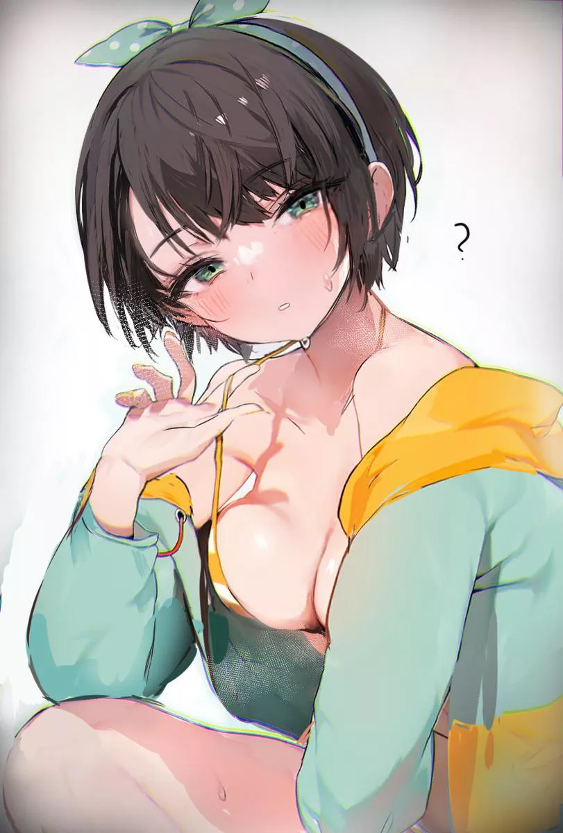 Pulling her bikini top