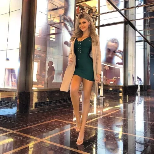 Tight mini-dress and nice legs