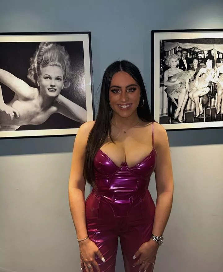 Amy wrapped up in tight shiny outfit