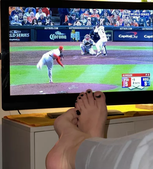 Are you more interested in my feet or baseball??