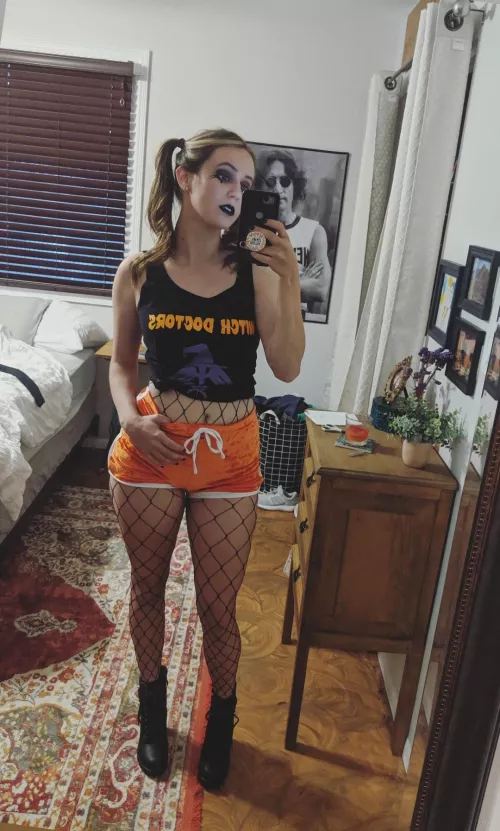 Fishnets complete the outfit