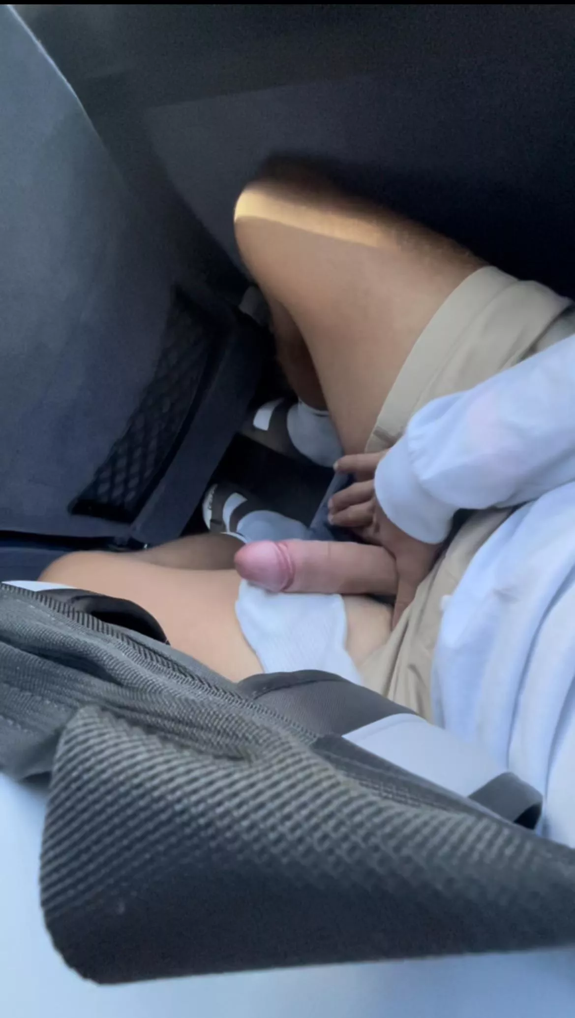 On the gray hound with a full bus of people.