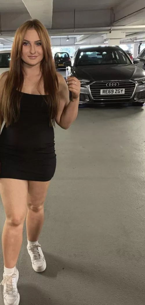 What do you think of this curvy redhead?