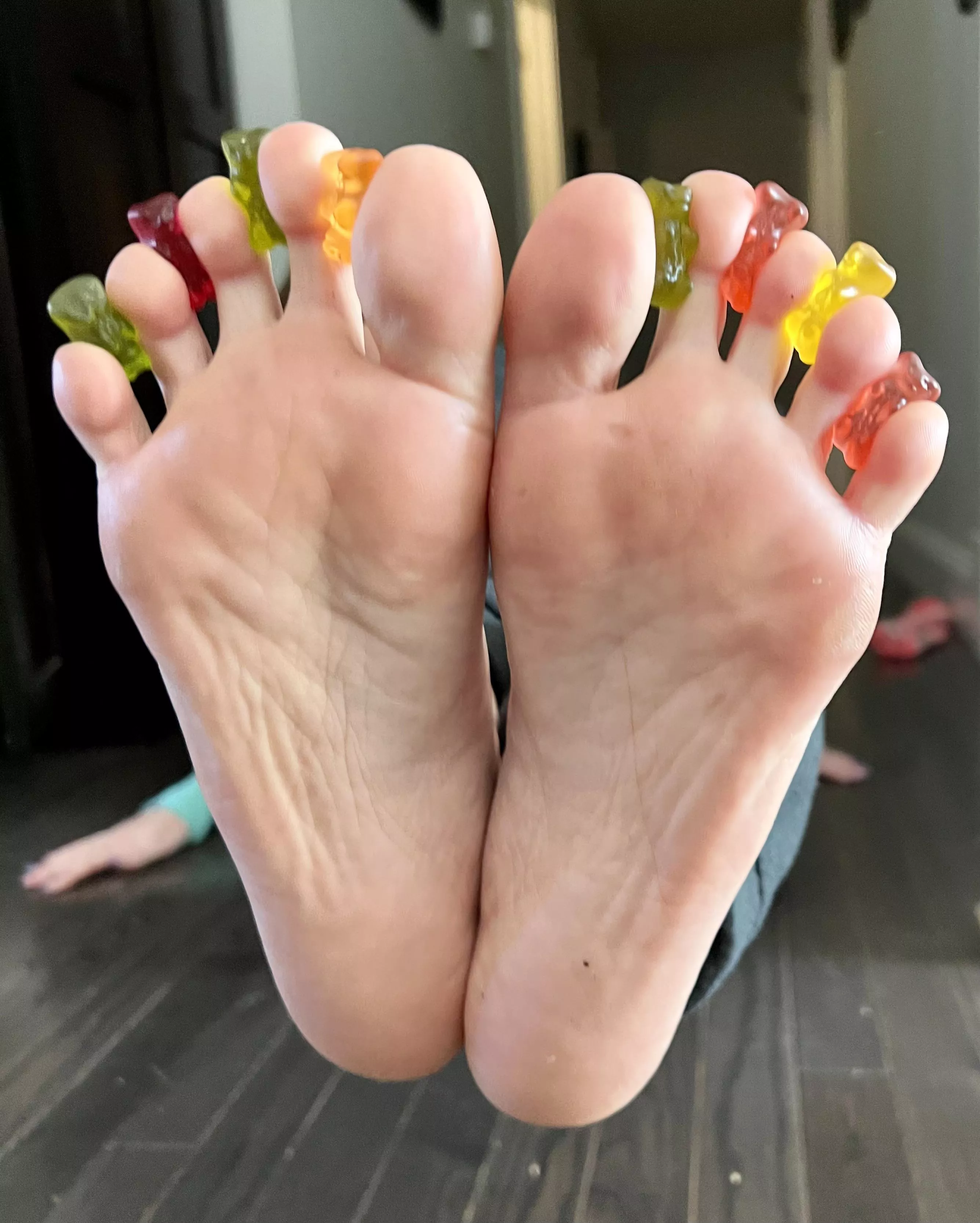 Would you lick the gummy bears between my toes?