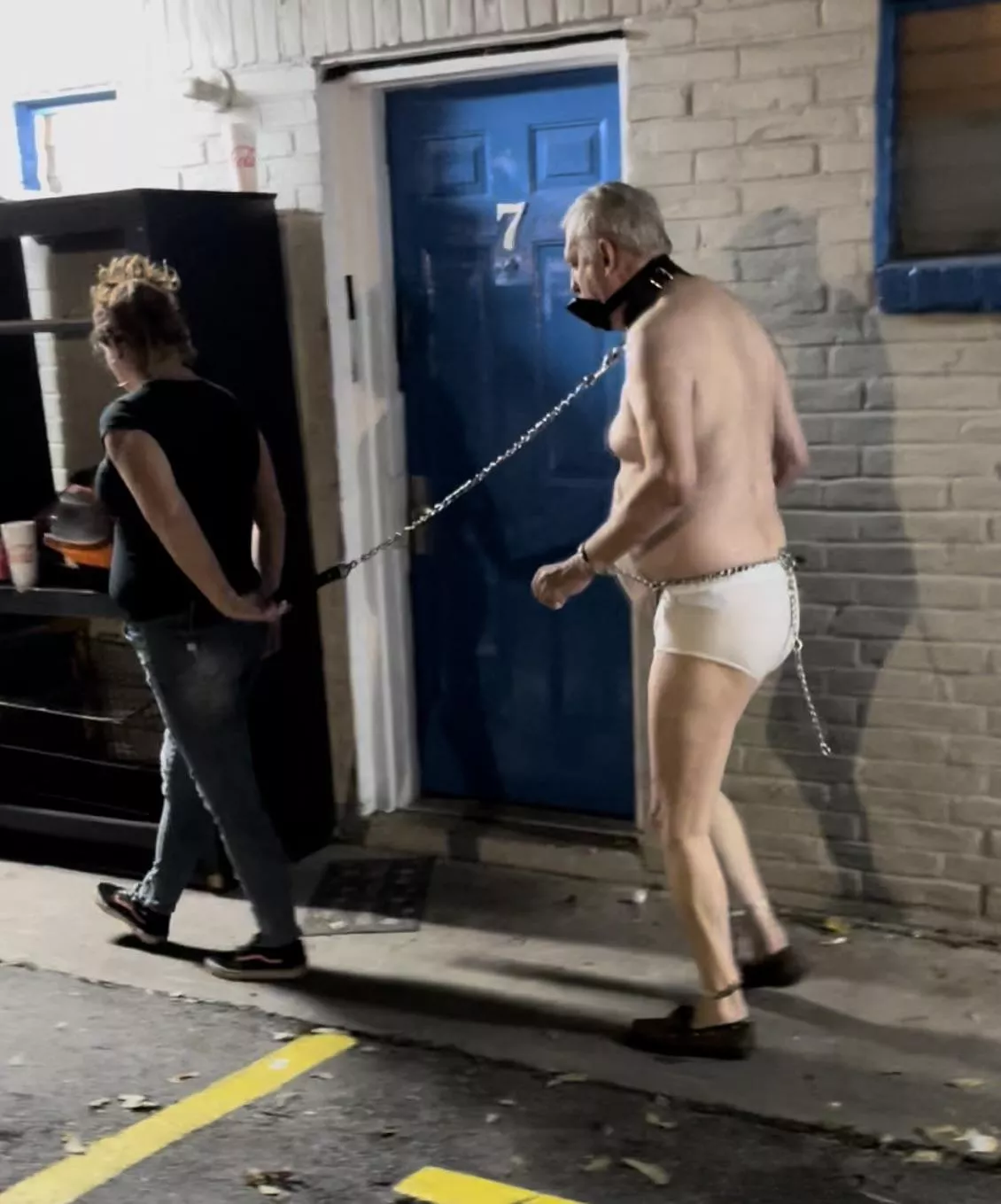 [OC] Taken for a walk. Locked in a butt plug harness, dildoed, and penis gagged.