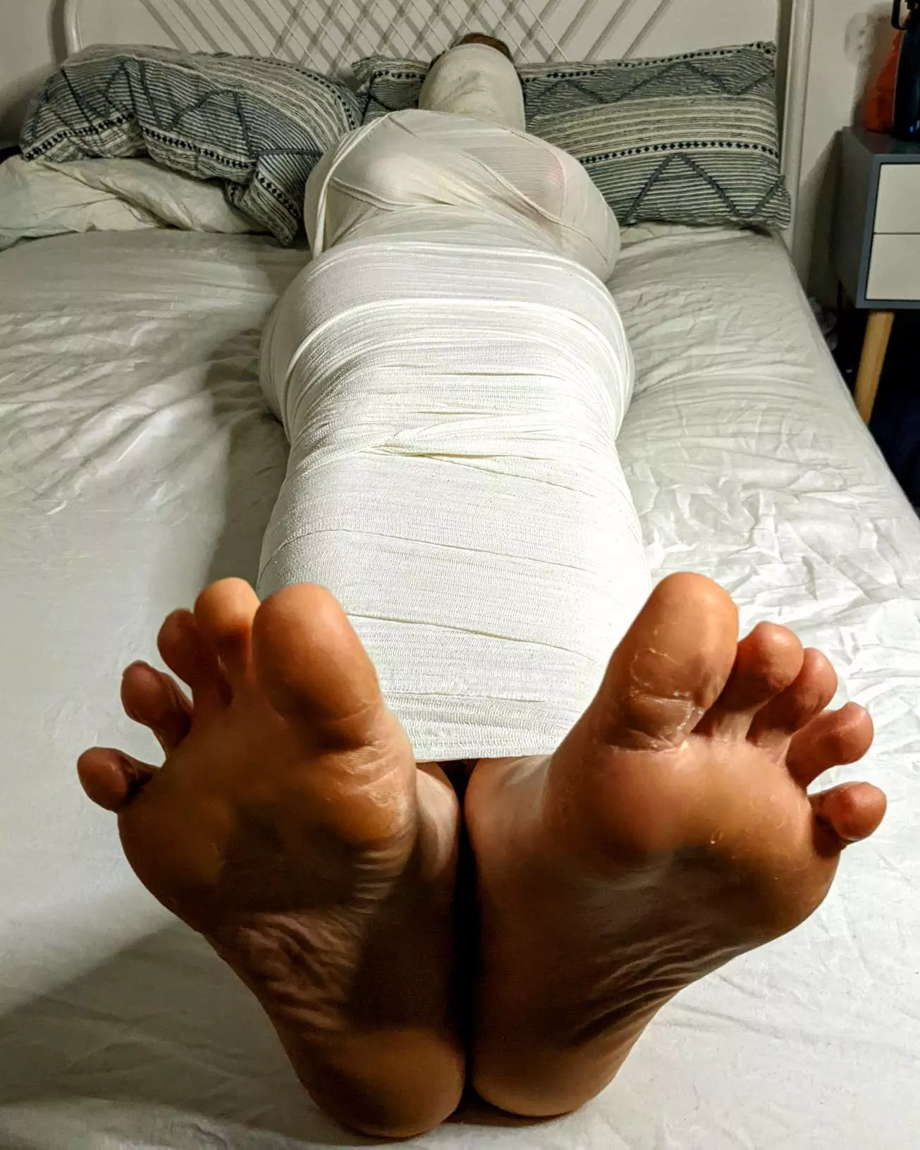 Helpless Feet In Bondage