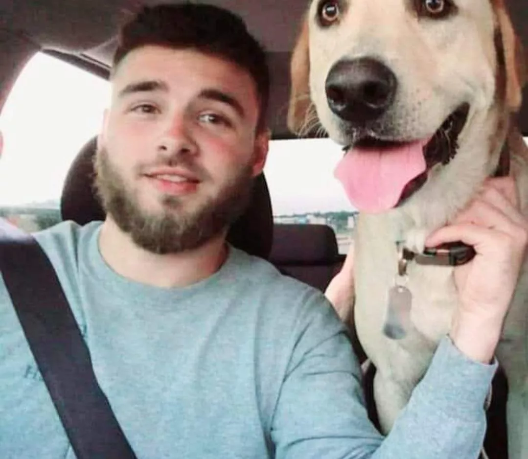 just look at that good ol boy. he loves car rides.