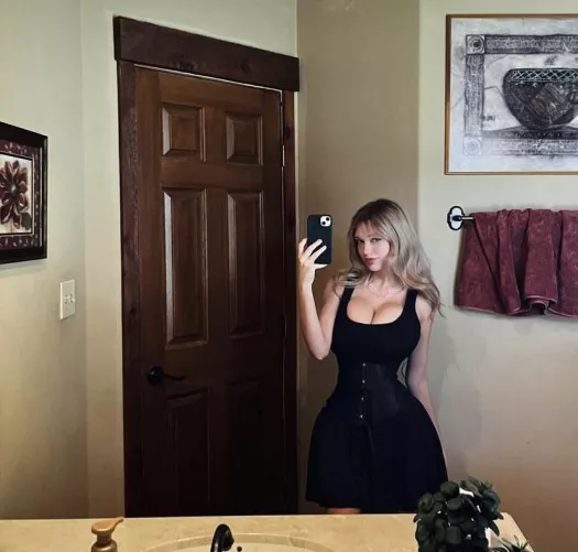 She looks so good in that corset