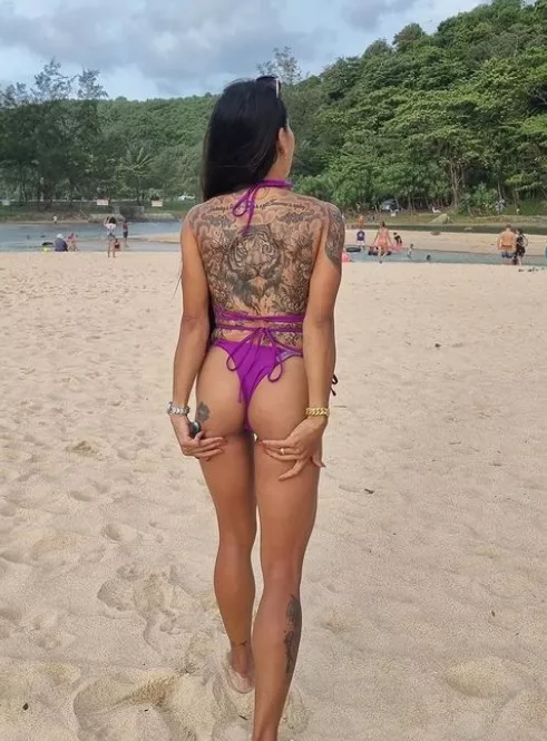 Admire my ink while you wreck this peach