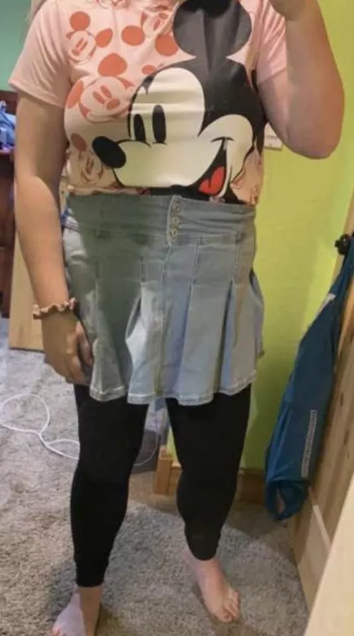 baby girl wanted to show off her new outfit to everyone, but she really needed a diaper change right after.