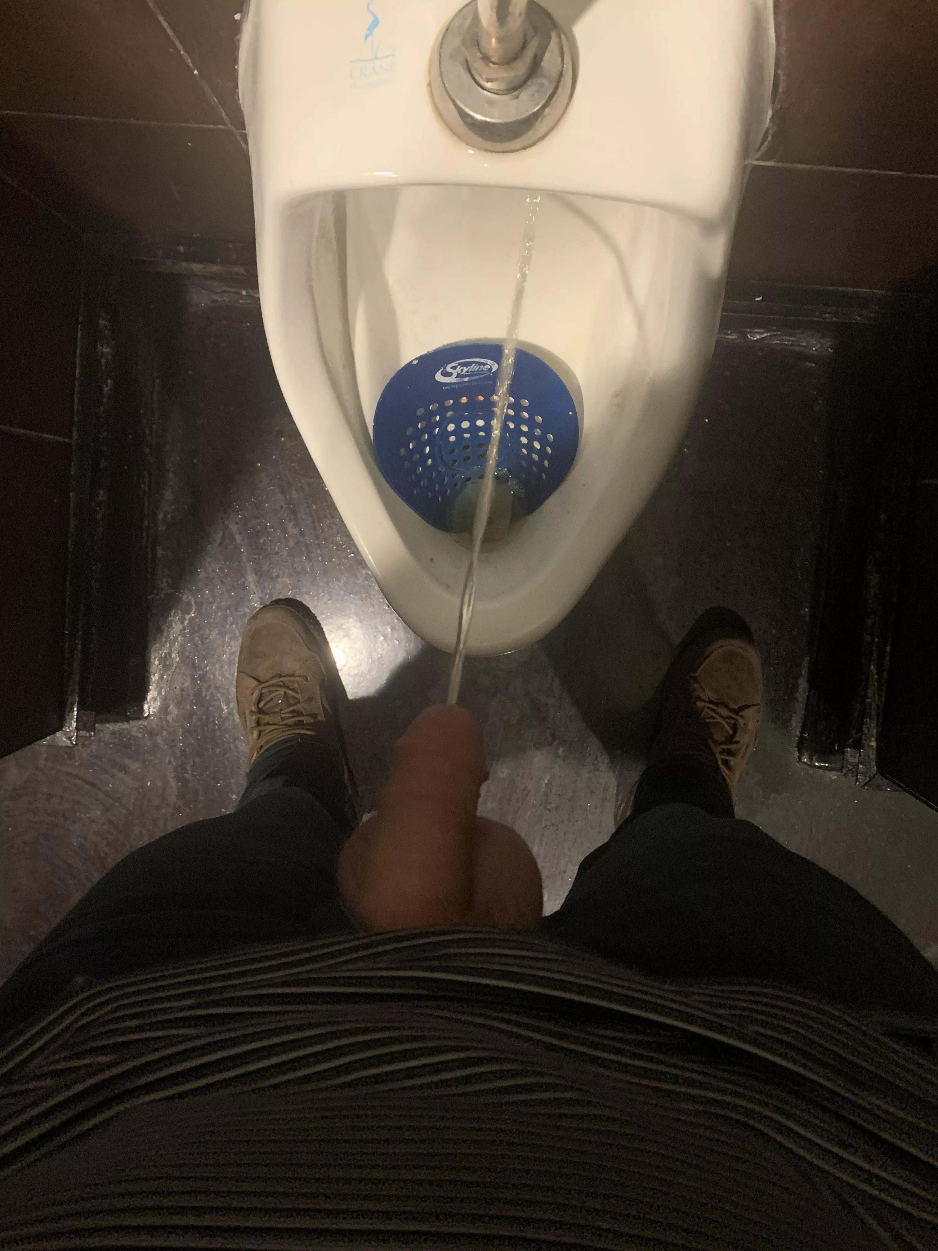 Is it weird that I pull my balls out when I’m at the urinal?