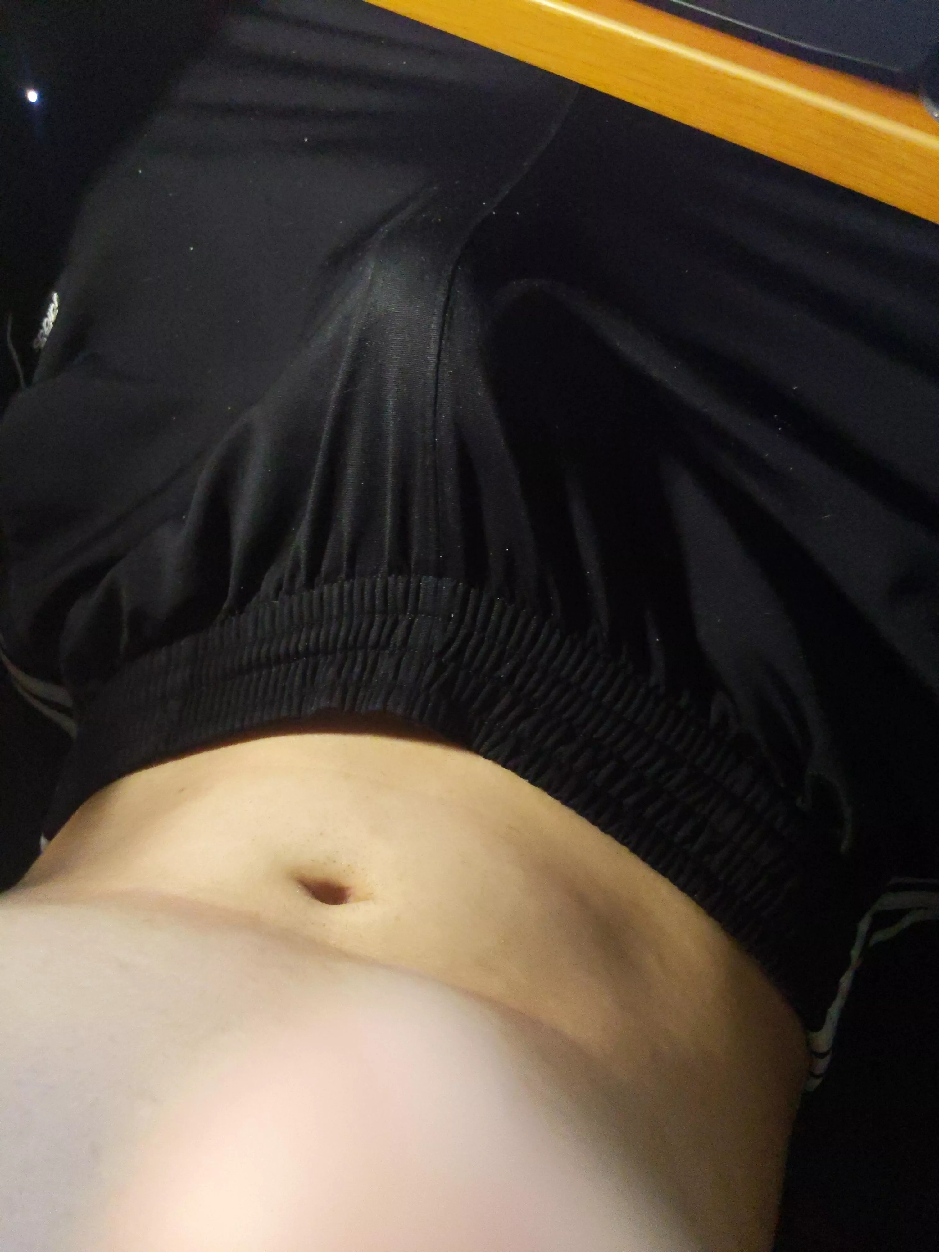 Lounging in sweatpants... And nothing else