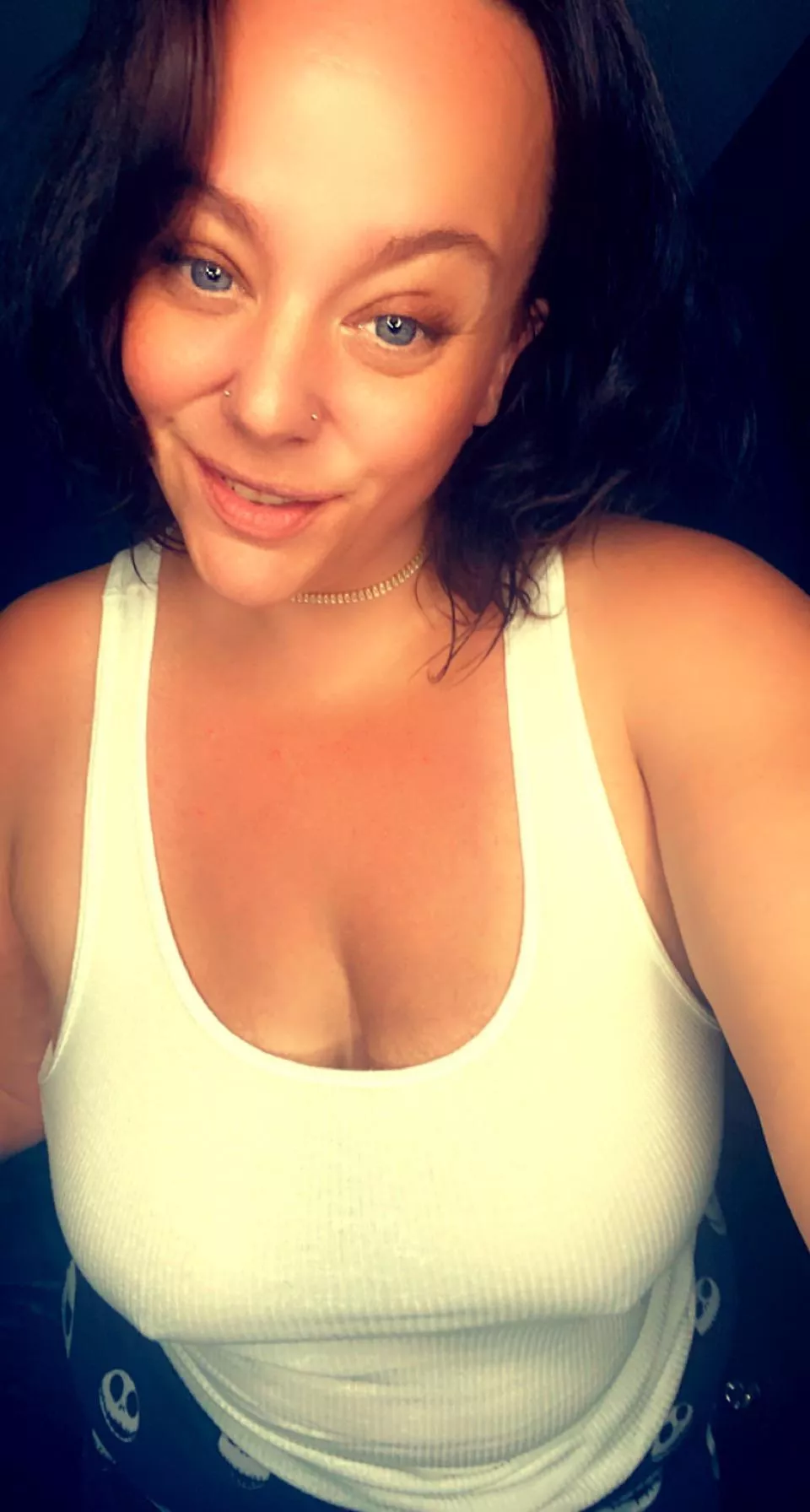 Standing in the kitchen with my wife beater on