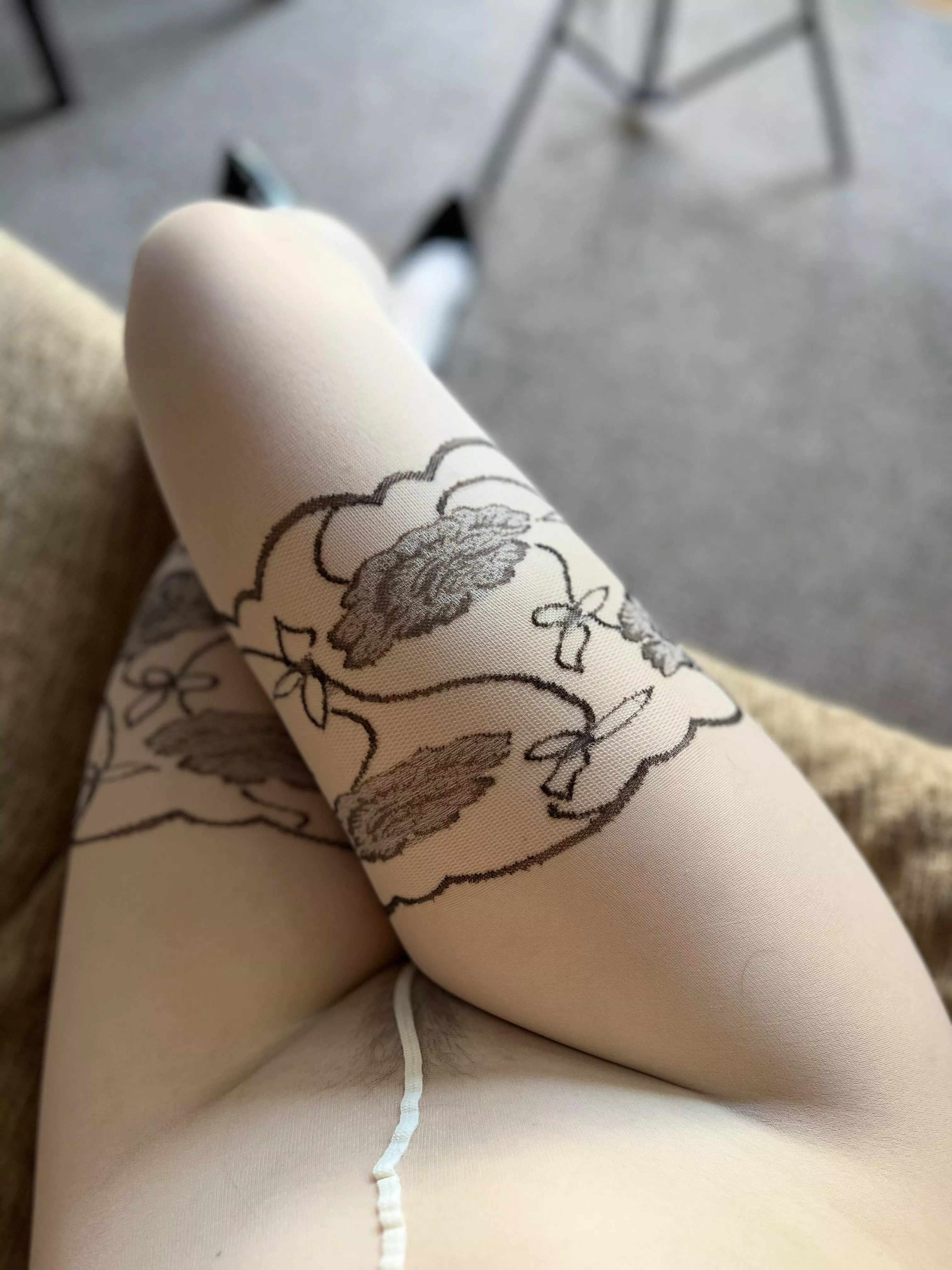 Legs in white pantyhose