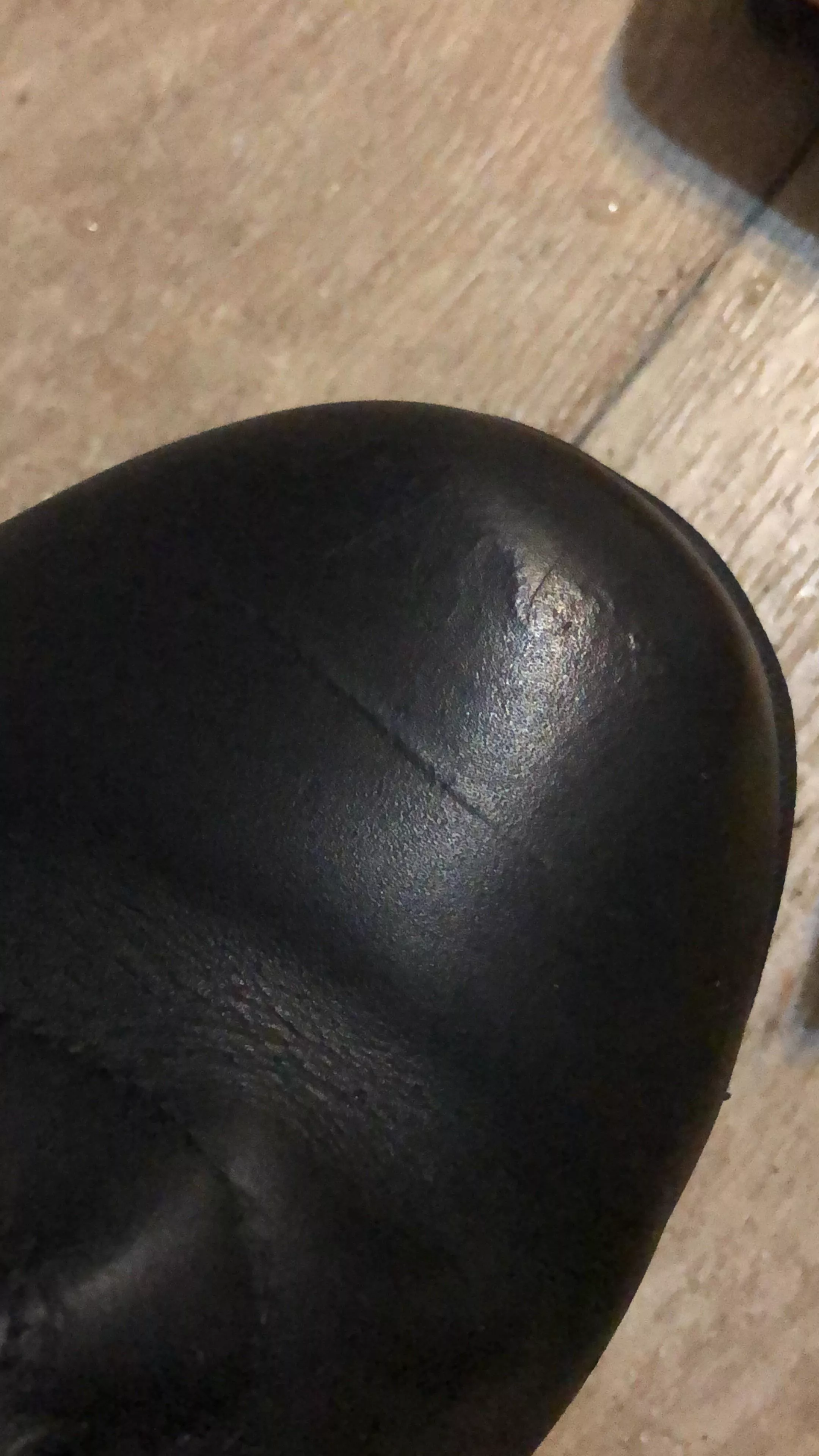 Raised stripe/scratch in a pair of boots, any way to fix it?