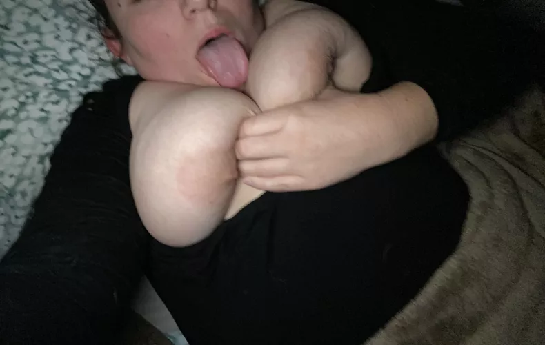 Seeing if my tongue touches my tits