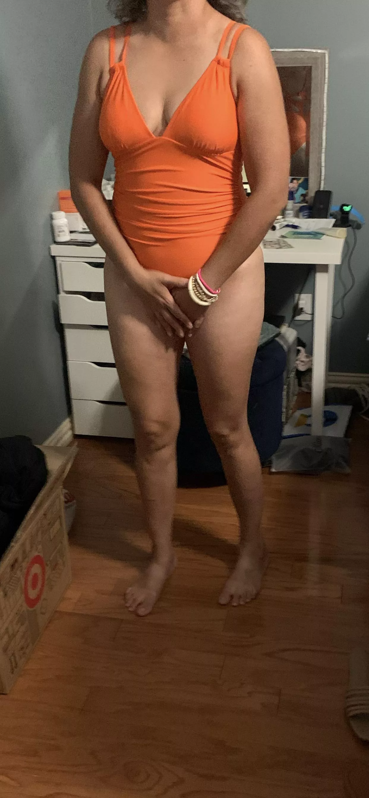 Showing you unaware wife trying on bathing suits for next vacation . Not much but like to show her off.