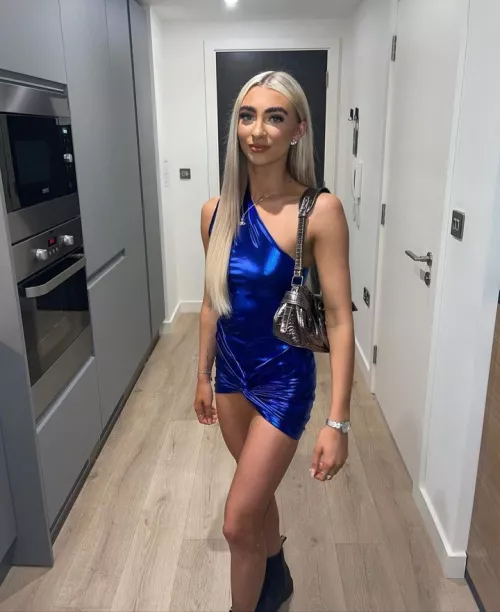 Hot Holly in blue shiny dress
