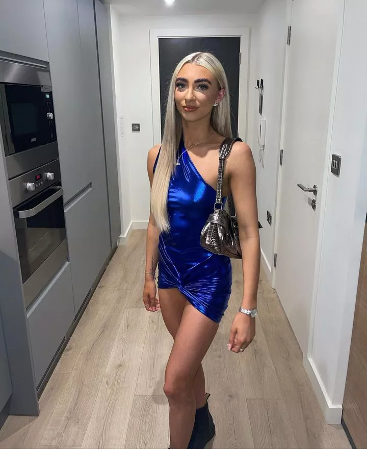 Hot Holly in blue shiny dress