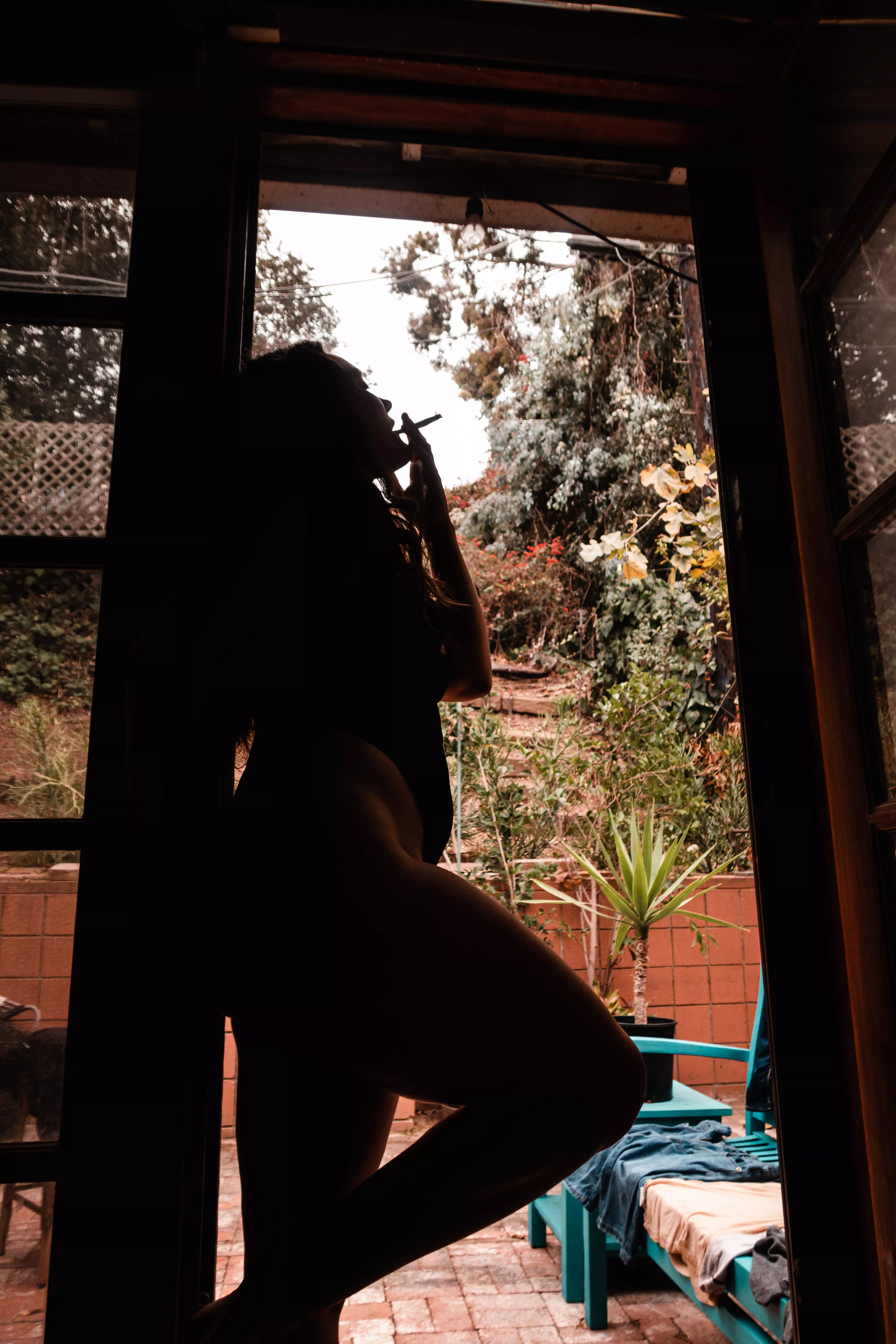 Smoking weed in the doorway