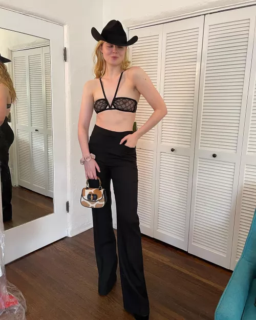 Elle Fanning in a see-through top